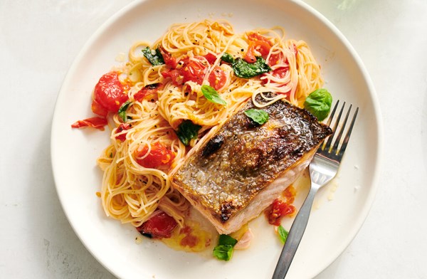 Salmon with garlic butter and tomato pasta [Ali Slagle]