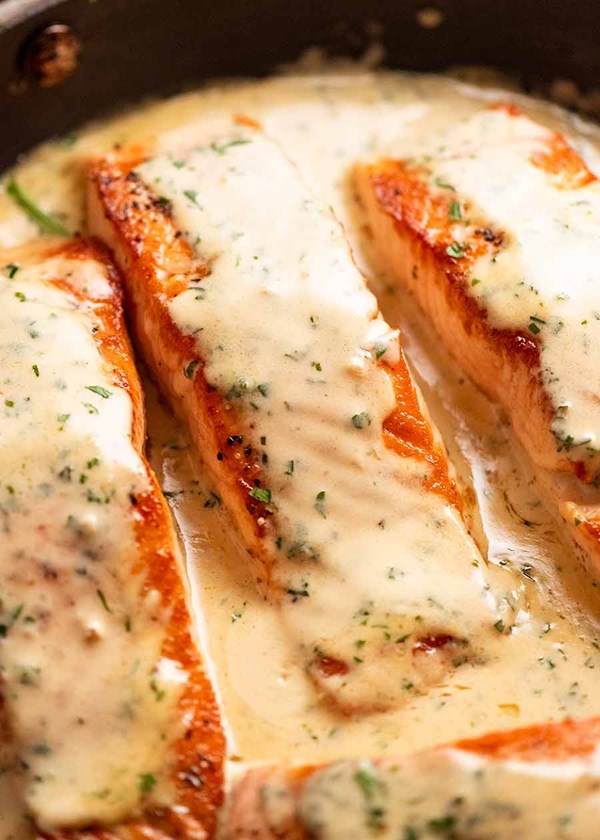 Salmon with herb & garlic cream sauce