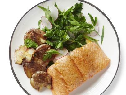 Salmon with potatoes and herb salad