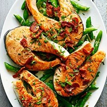 Salmon with snap peas, bacon, and mint