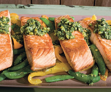 Salmon with snap peas, yellow peppers, and dill-pistachio pistou