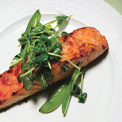 Salmon with sweet chili glaze, sugar snap peas, and pea tendrils