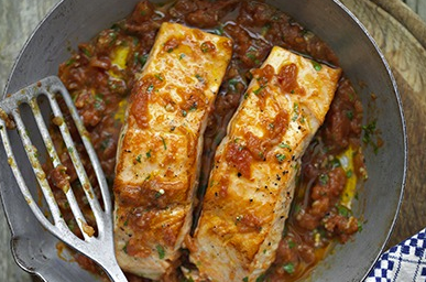 Salmon with tomato, ginger and coriander