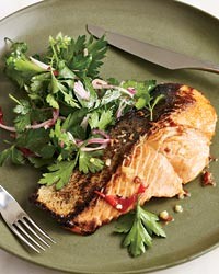 Salmon with vodka sauce and parsley salad