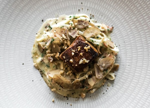 Salsify carbonara with confit pork cheek, crackling and chestnuts