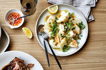 Salt-baked celeriac with miso butter, coriander and shallots