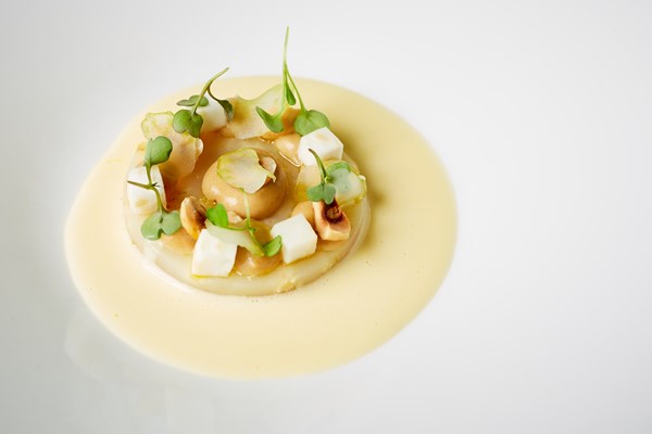 Salt-baked celeriac with pickled celery, toasted hazelnut and truffle buerre blanc