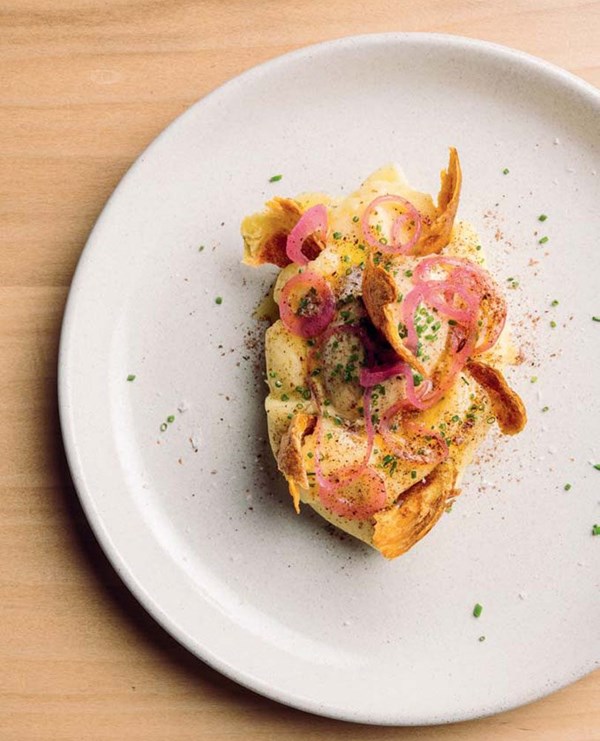 Salt-baked potato mash with skin chips, pink pickled onions & burnt-onion butter