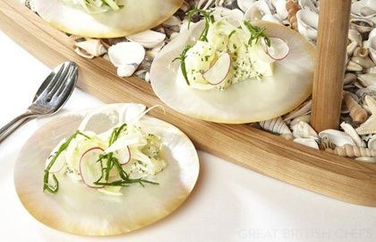 Salt baked sea trout with cockles and new potato salad