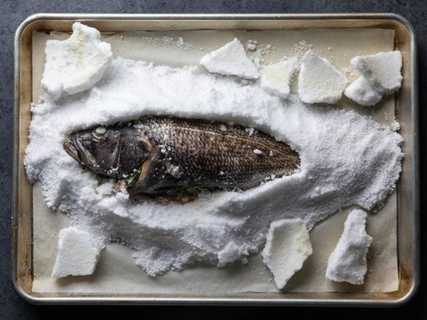 Salt-baked whole fish with fresh herbs