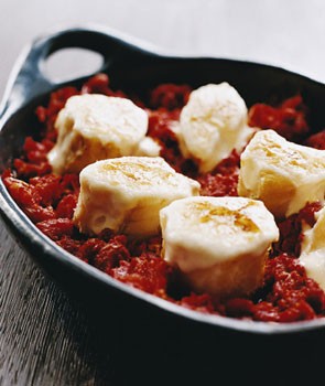 Salt cod in tomato garlic confit