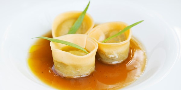 Salt cod tortelli with mushroom broth
