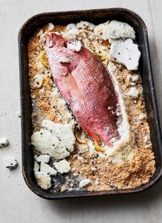 Salt-crusted fish with aji verde sauce