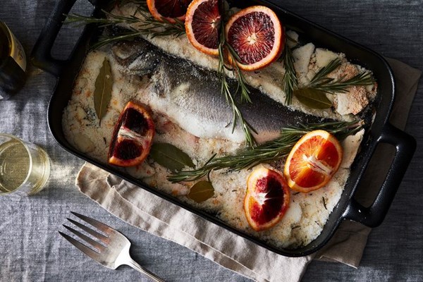 Salt crusted whole fish with blood oranges