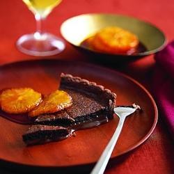 Salted caramel chocolate tart with burnt oranges