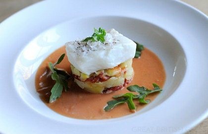 Salted cod with crushed potatoes, chorizo, tomato and thyme vinaigrette
