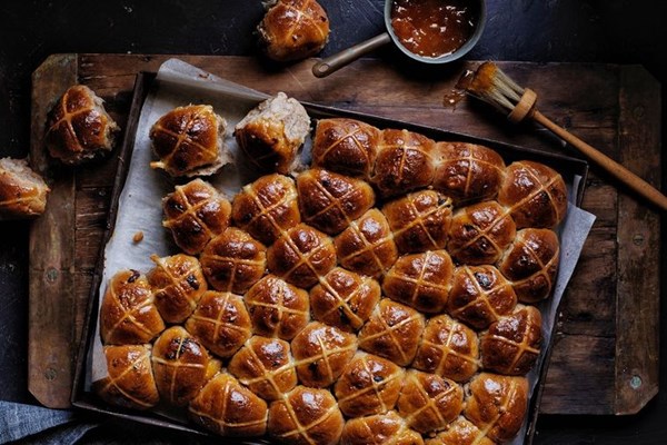 Salted peanut butter & jelly-glazed hot cross buns