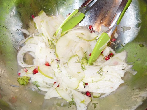 Salty sweet apple fennel salad with pomegranate seeds