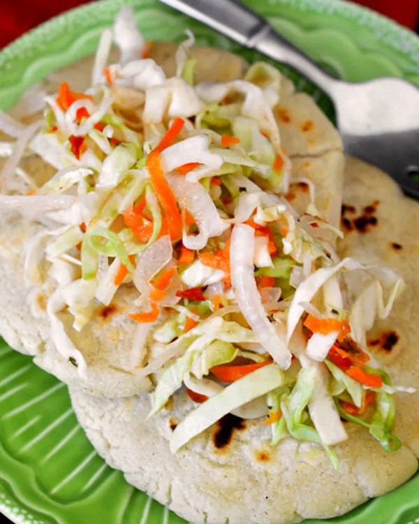 Salvadoran masa cakes with cabbage slaw (Pupusas con curtido)