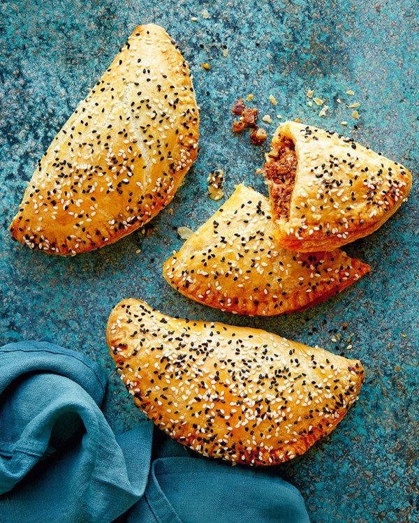 Sardine hand pies with cornichons and paprika