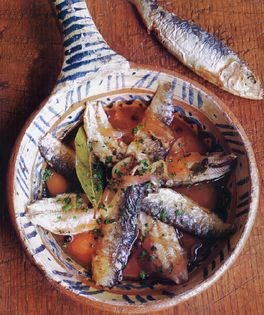 Sardines en escabeche with red onion, tomato, and white wine