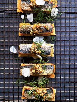 Sardines on toast with sweet onion and pine nut tarator
