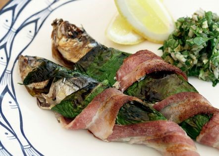Sardines wrapped in smoked bacon (Grilled sardines wrapped in smoked bacon and wild garlic with a wild garlic persillade)