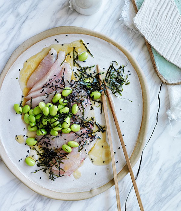 Sashimi of mulloway with a sesame-citrus dressing, edamame and seaweed