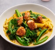 Saucy curried noodle bowl with crispy chicken