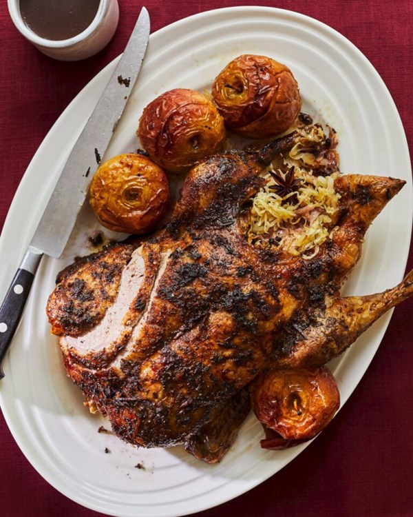 Sauerkraut-stuffed duck with roast apples and mulled wine gravy 