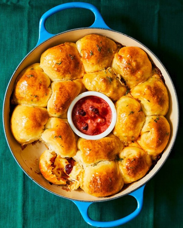 Sausage & cheese brioche balls with ‘nduja cranberry dip