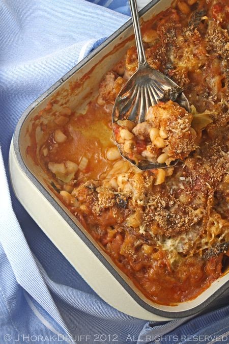 Sausage and cannellini bean gratin with kale and Parmesan