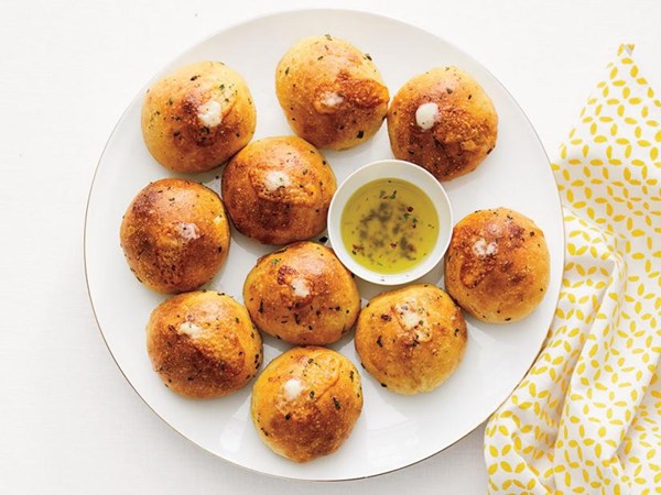 Sausage and cheese rolls with sage oil
