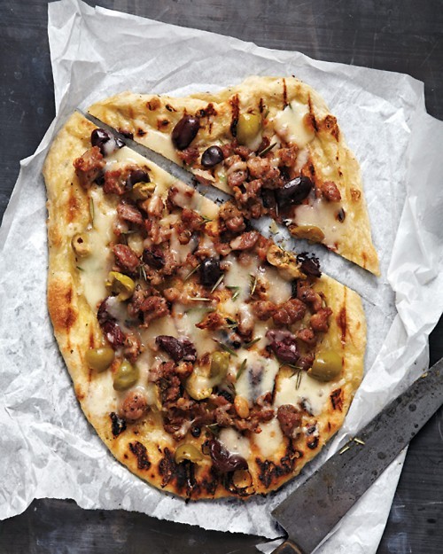 Sausage and olives pizza