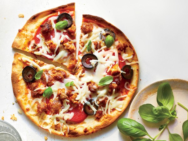 Sausage and tomato mini pizzas
