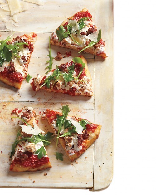 Sausage, arugula, and parsley pizza
