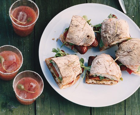 Sausage, arugula, and piquillo pepper sandwiches