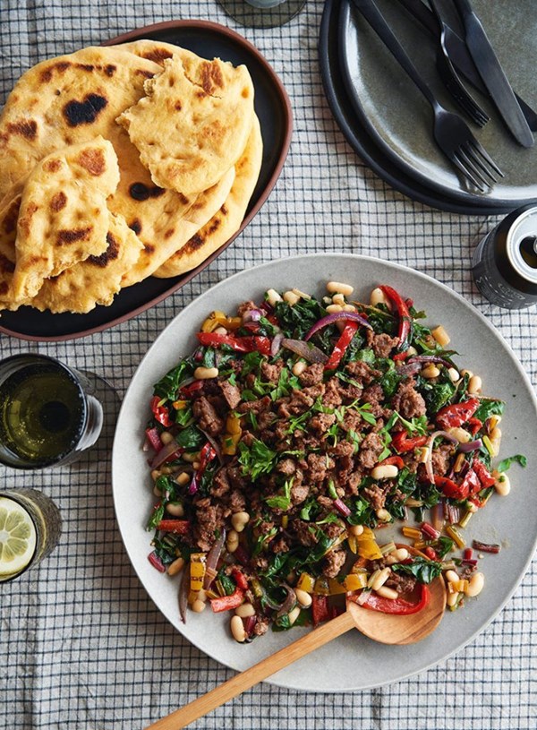 Sausage, chard and beans with kumara somun