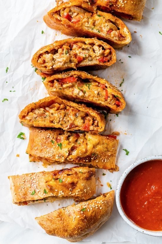 Sausage pepper and onion stromboli (stuffed sausage bread)