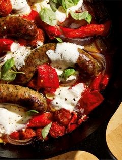 Sausage, peppers, and onions with melty Caprese