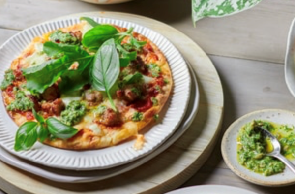 Sausage pitas with herb pesto