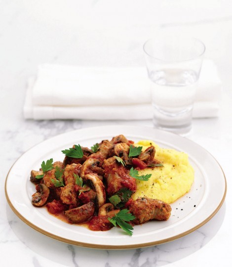 Sausage ragù on cheesy polenta