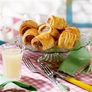 Sausage rolls with a ham and cheddar crust