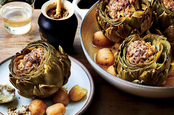 Sausage-stuffed artichokes with new potatoes