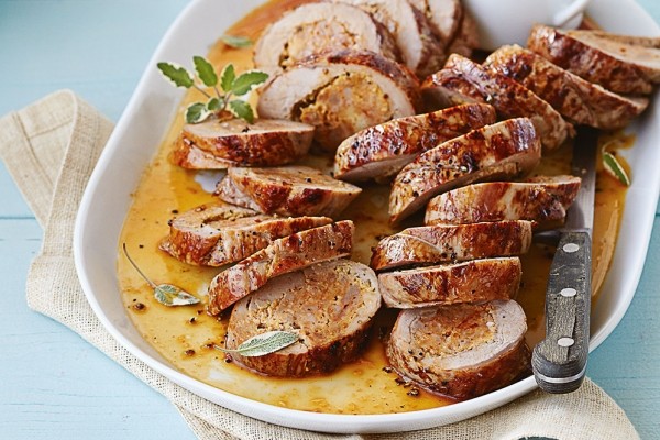 Sausage-stuffed pork tenderloin with creamy mustard sauce