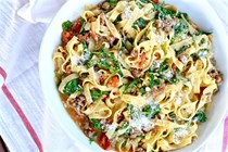 Sausage, tomato, and arugula fettuccine