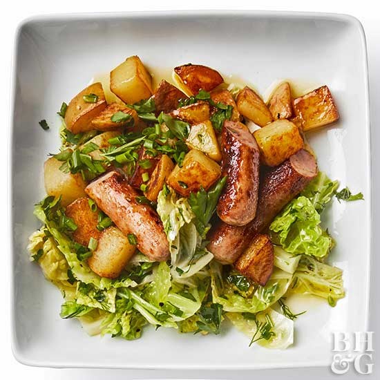 Sausage with skillet potatoes and buttered cabbage