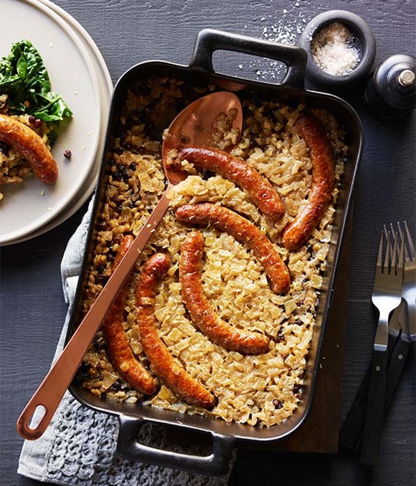 Sausages braised with barley, currants, lemon and silverbeet