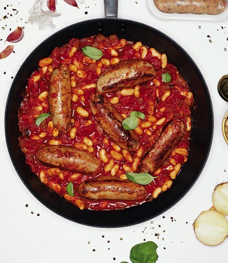 Sausages in tomato sauce with cannellini beans