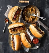 Sausages with beer-braised onions